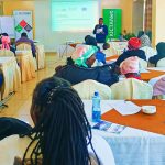 A photo of Nicodemus Nyakundi conducting a training for women with disabilities in Nakuru