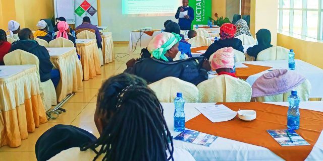 A photo of Nicodemus Nyakundi conducting a training for women with disabilities in Nakuru