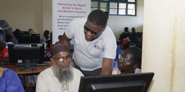 Kenya Society for the Blind at the Okame Technical and Vocational College in Busia County training basic computer navigation for persons with disabilities under the Digital Access Programme.