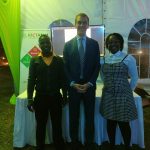 Florence and Nicodemus flank the Deputy British High Commissioner Dr. Ed Barnett