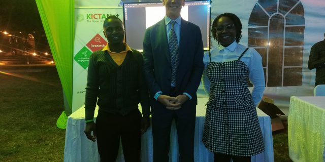 Florence and Nicodemus flank the Deputy British High Commissioner Dr. Ed Barnett