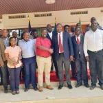 Busia County Governor Dr. Paul Nyongesa Otuoma and UK-AID's Mr Charles Juma (UK-Digital Access Program Country Lead and Advisor)  shake hands during a courtesy visit to the Governors' office to report on the impact of the Strengthening Digital Communities project in the county.